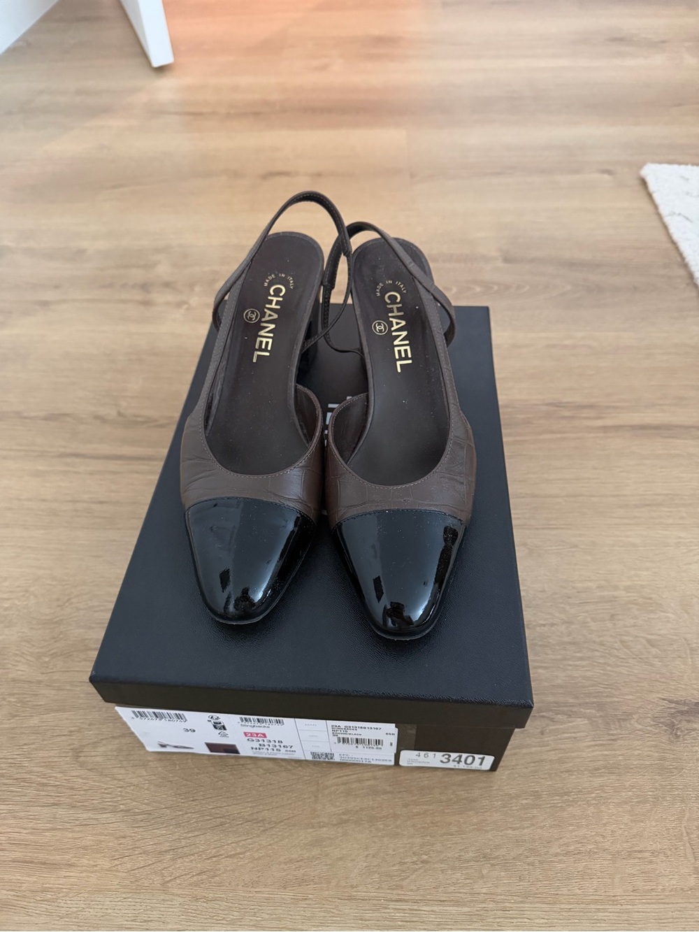 CHANEL Brown Leather Slingback Pumps with Black Patent Cap Toe